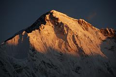
The sun slowly descends the south face of Cho Oyu (8201m), the sixth highest mountain in the world, at sunrise from Gokyo, turning the colour of the face from a golden yellow to extremely bright white within a few minutes.
